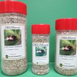 Three jars of CRUSHforce snail attractant bait on a green background.